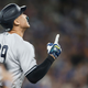 Aaron Judge #99 of the New York Yankees runs the bases as he hits his 61st home run of the season in the seventh inning against the Toronto Blue Jays at Rogers Centre on September 28, 2022, in Toronto, Ontario, Canada. Judge has now tied Roger Maris for the American League record